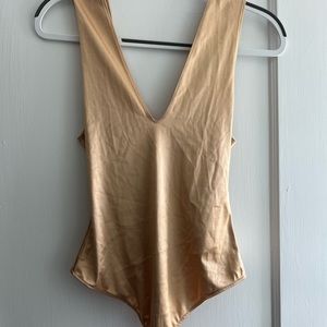 Free People Keep It Sleek Bodysuit in Champagne/Gold